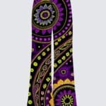 A purple and yellow paisley pattern on a black background.