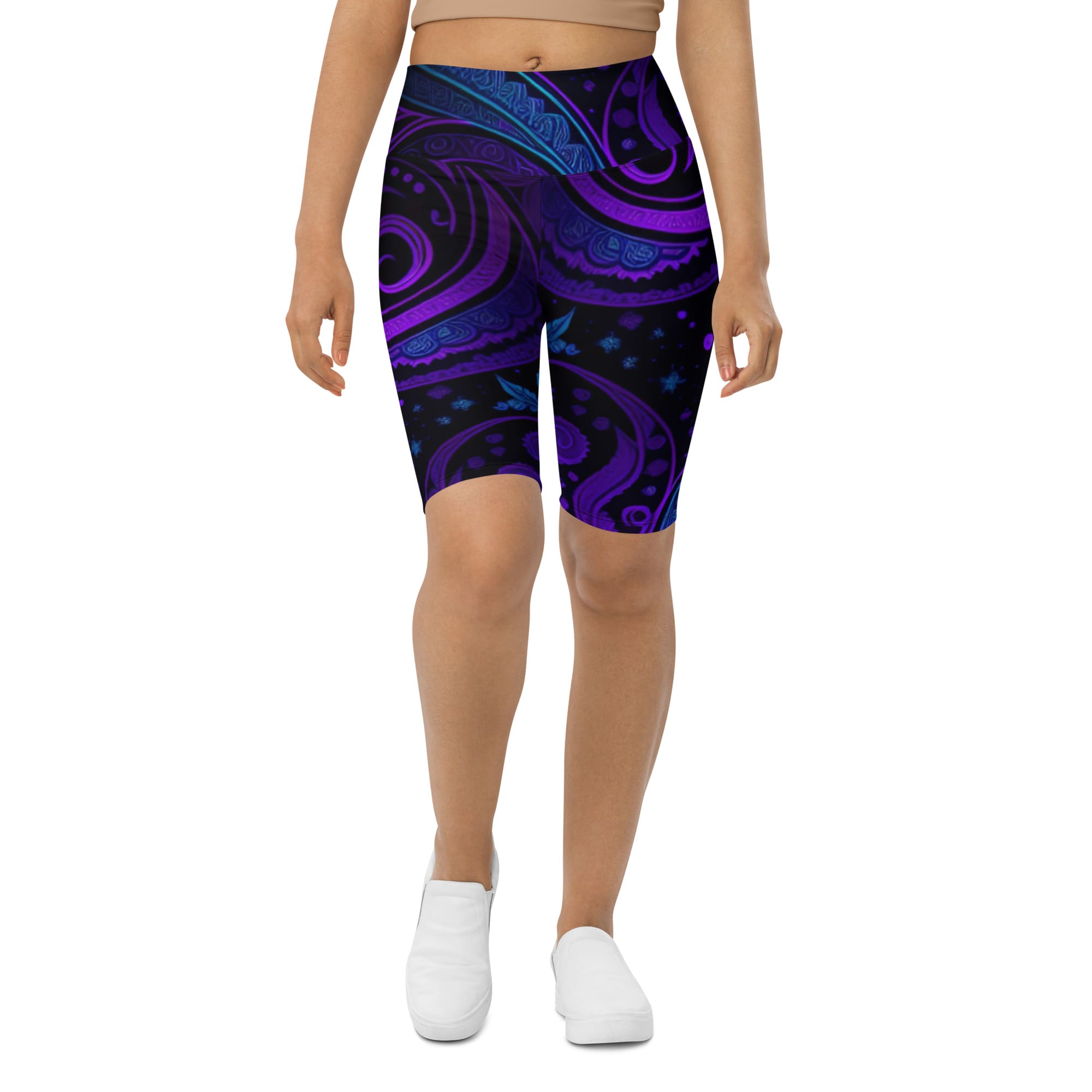 A woman wearing purple and blue shorts with a pattern