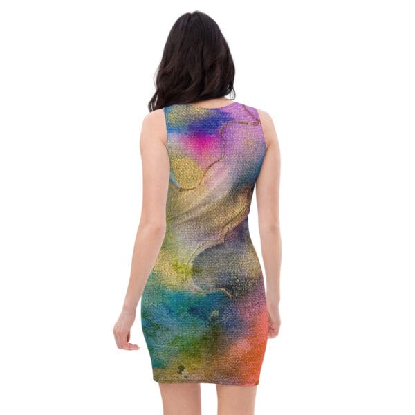 A woman wearing a dress with colorful abstract art.