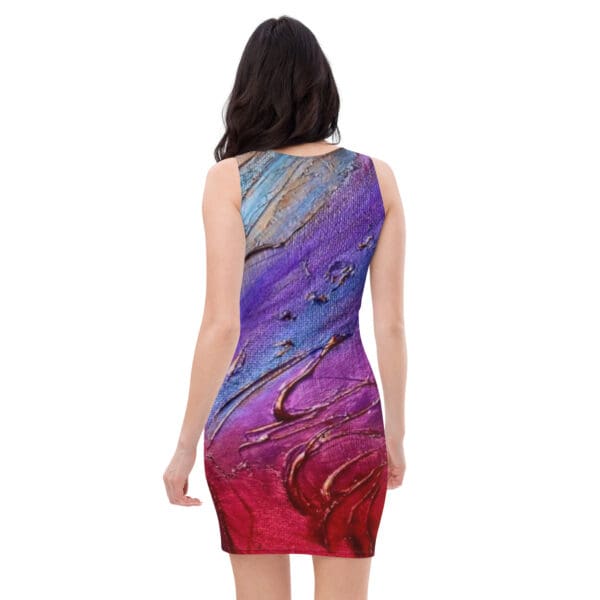 A woman wearing a dress with a painting of purple and red.