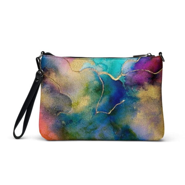 A colorful painting of clouds and sky on a purse