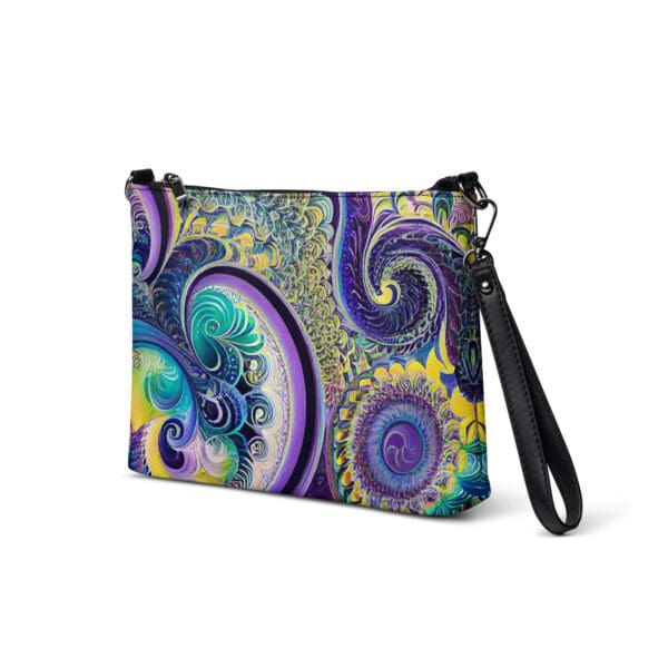 A purple and yellow abstract design on a purse.