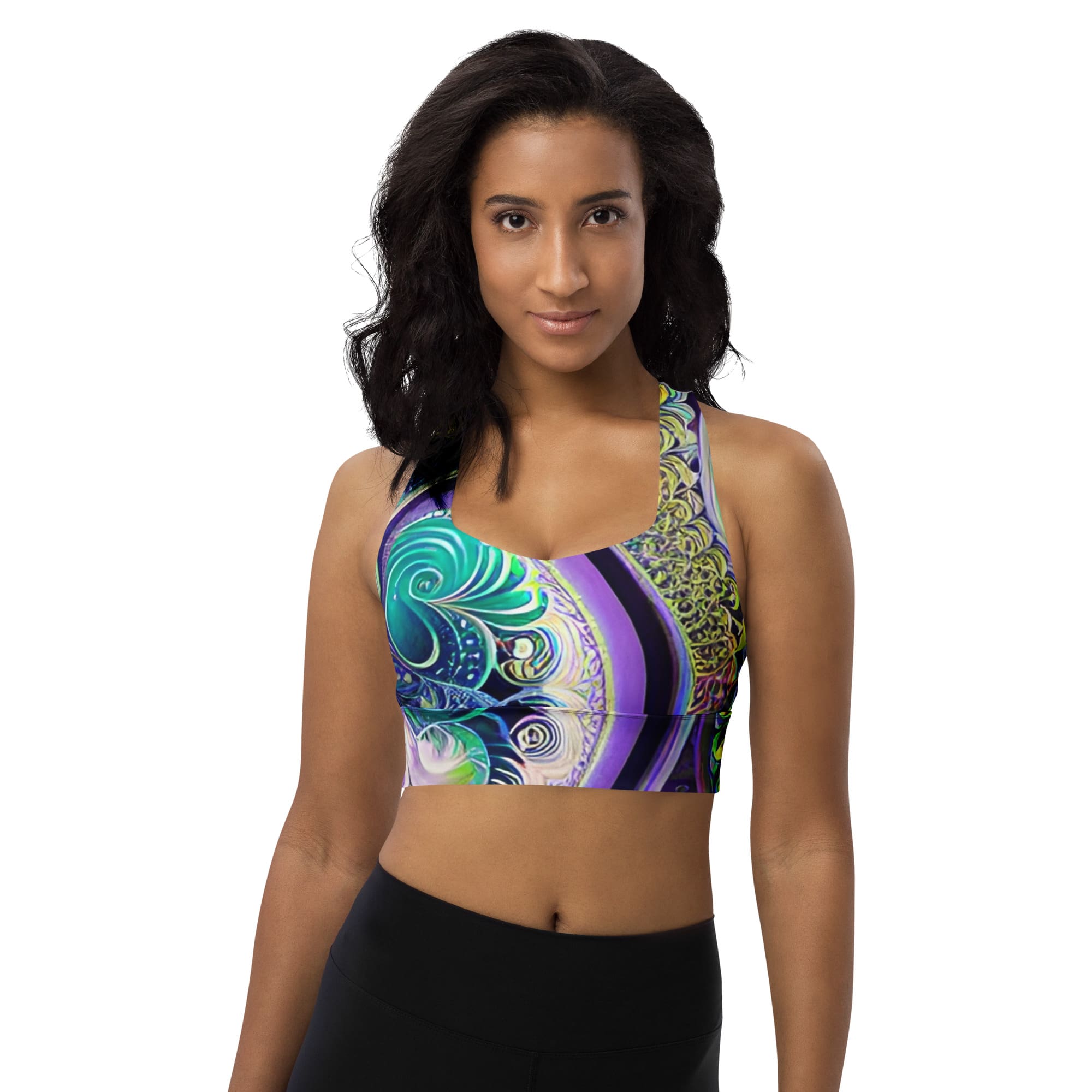 A woman wearing a sports bra with an artistic design.