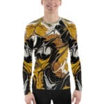 A man wearing a long sleeve shirt with an abstract design.