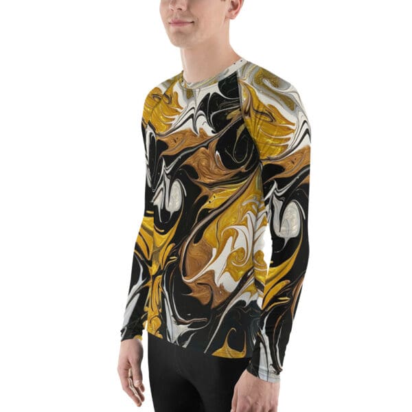 A man wearing a long sleeve shirt with abstract art.