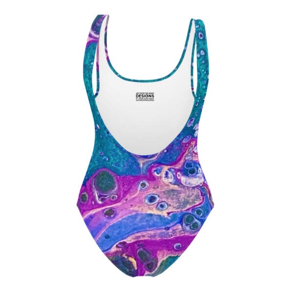 A woman wearing a bathing suit with an abstract design.