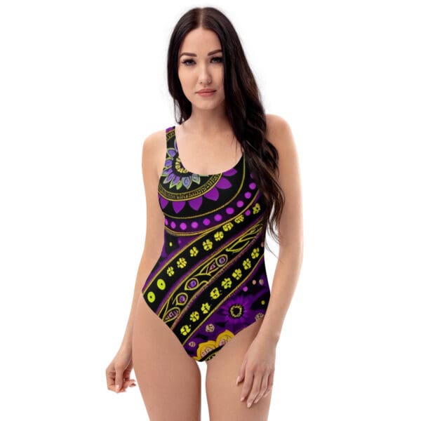 A woman in a purple and yellow one piece swimsuit.