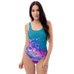 Model wearing a colorful swimsuit design.