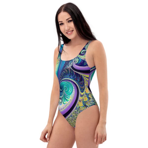 A woman in a blue and purple one piece swimsuit.