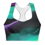 Abstract design sports bra in teal and purple.