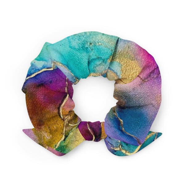 A colorful scrunchie with gold foil on it.