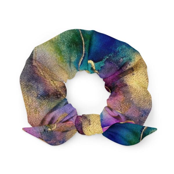 A colorful scrunchie with gold foil on it.