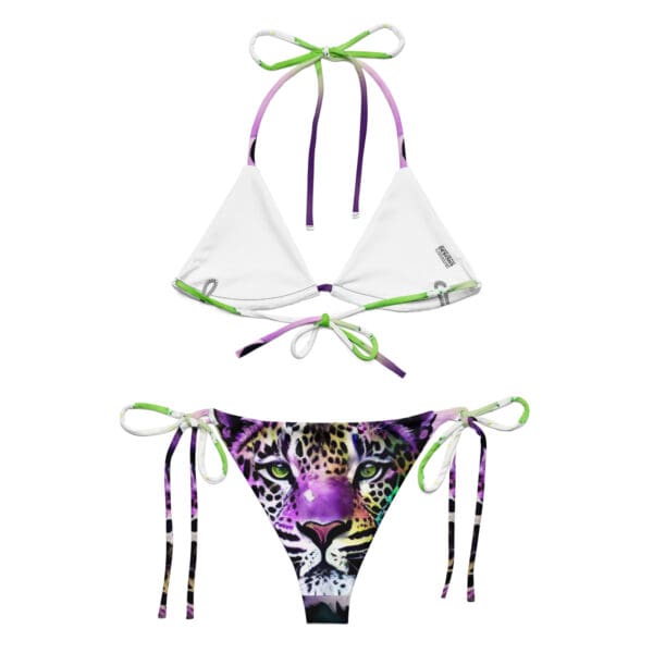 A purple and white bikini with a tiger face on it.