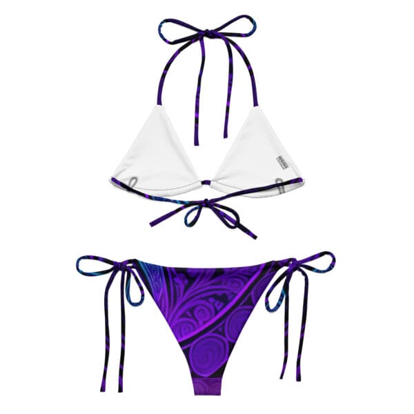 A purple and white bikini with two bows on the sides.