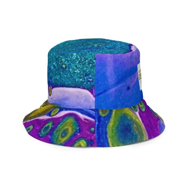 A colorful hat with a blue and purple design.