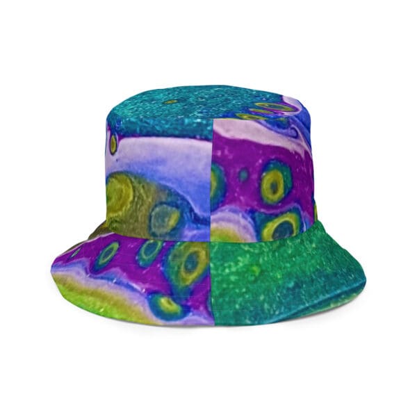 A colorful hat with a green and purple design.