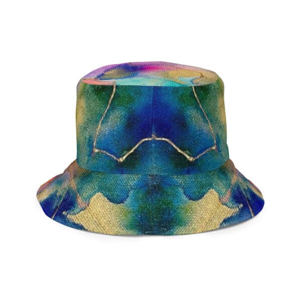 A tie dye bucket hat with a mask on top of it.