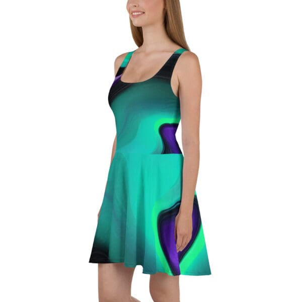 A woman wearing a dress that is green and purple.