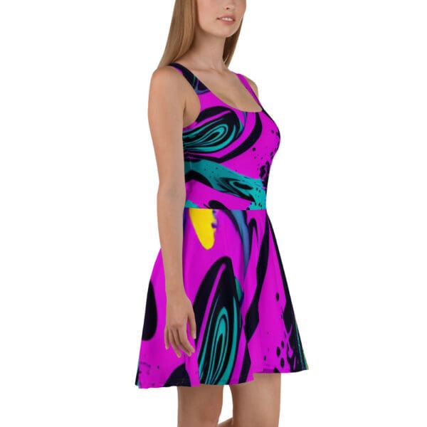 A woman wearing a dress that is purple and has some shapes on it