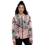 Woman wearing a stylish abstract-patterned jacket.