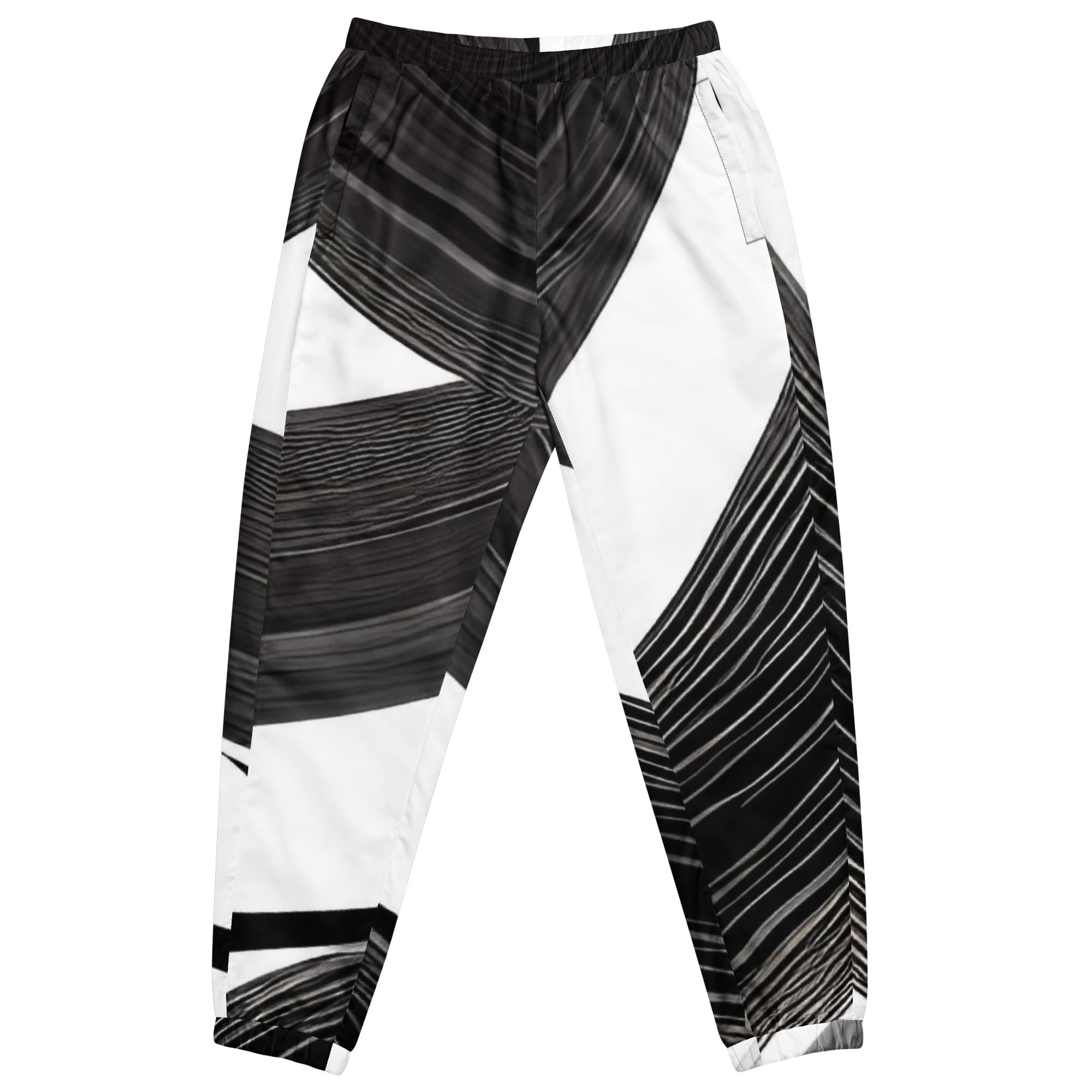 A pair of black and white pants with some paint on them