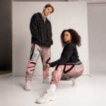 Two models in stylish, colorful outfits.