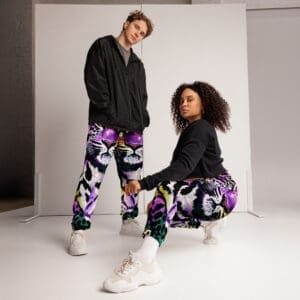 Two models in vibrant animal-print outfits.