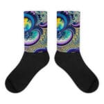 A pair of black socks with an image of om
