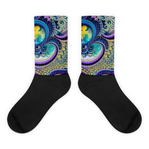 A pair of black socks with an image of om