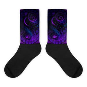 A pair of black socks with purple and blue designs