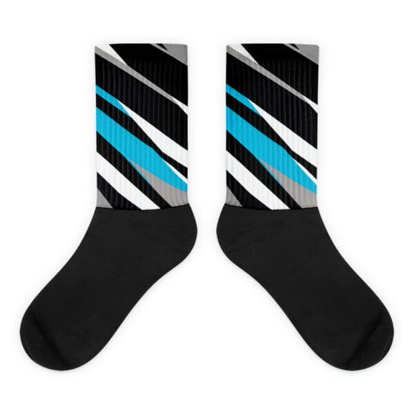 A pair of socks with black and blue stripes.