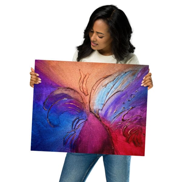 A woman holding up an abstract painting.