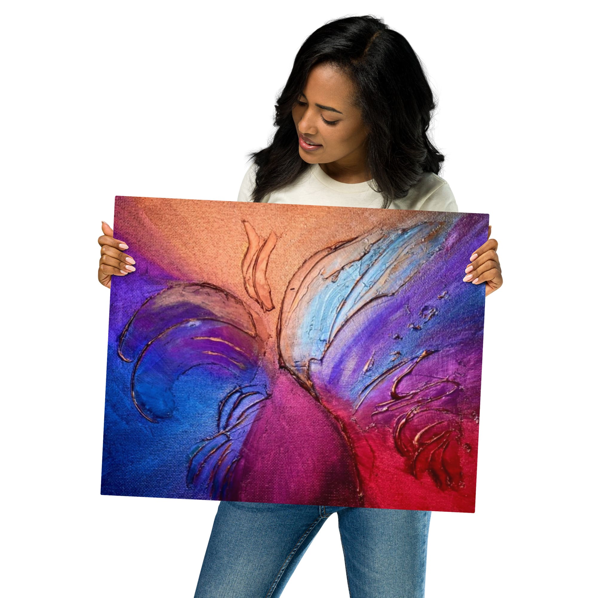 A woman holding up an abstract painting.