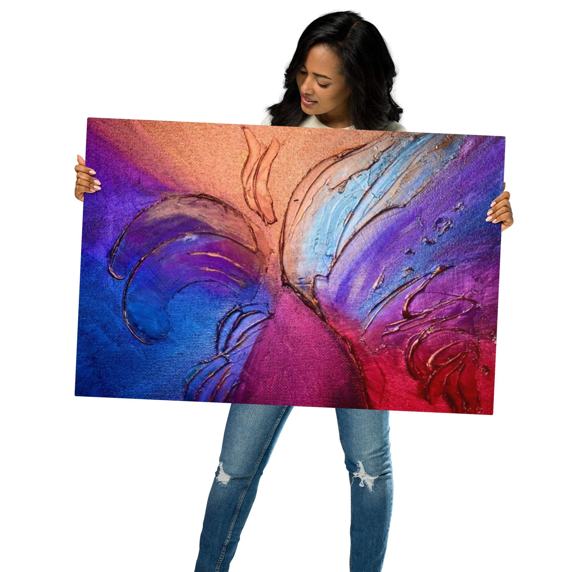 A woman holding up an abstract painting