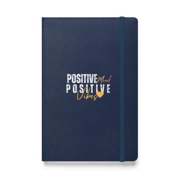 A blue notebook with the words " positive vibes ".