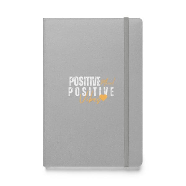 A notebook with the words positive and positive written on it.