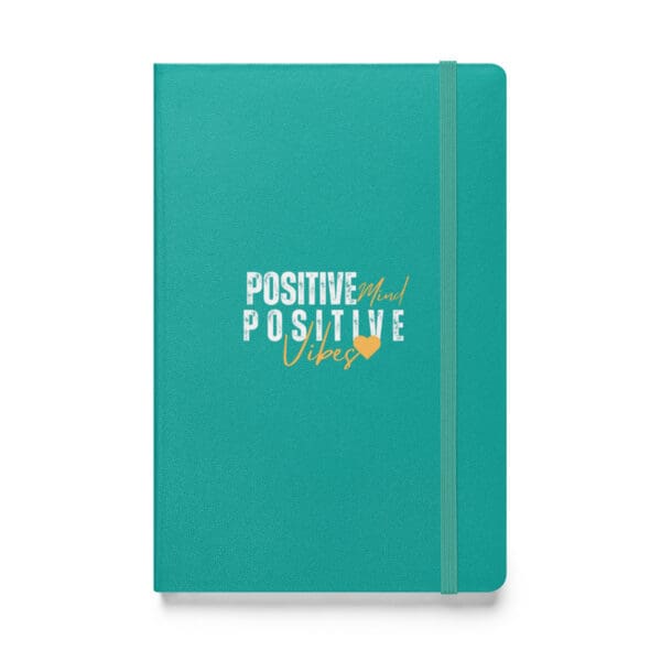 A notebook with the words " positive, positive, and happy ".