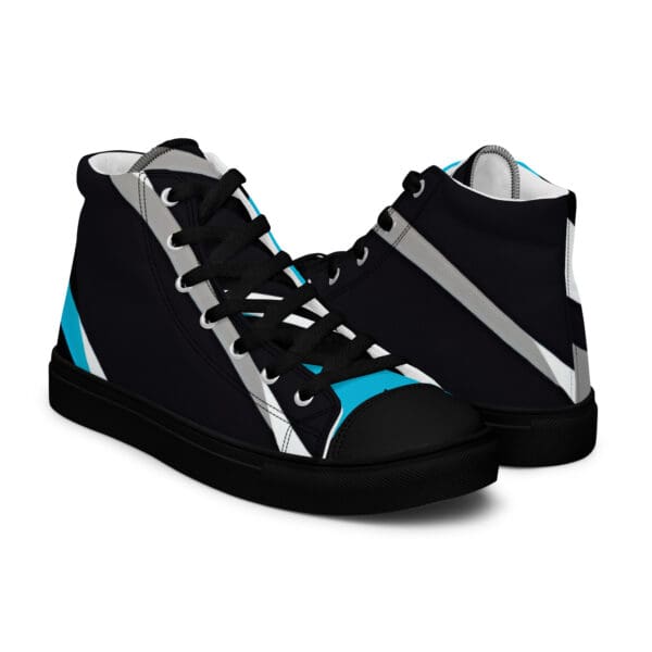 A pair of black and blue sneakers on top of a white background.