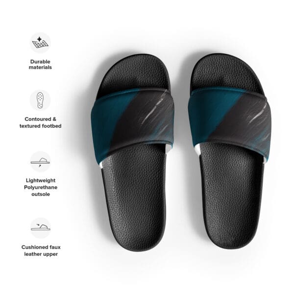 A pair of black and blue sandals on top of a white surface.