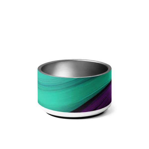 A bowl with a purple and green design on it.