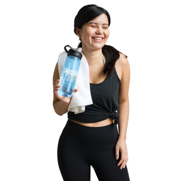 A woman holding a bottle of water and towel.