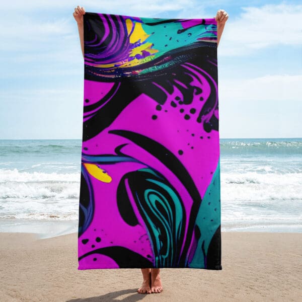 A person standing on the beach with a towel