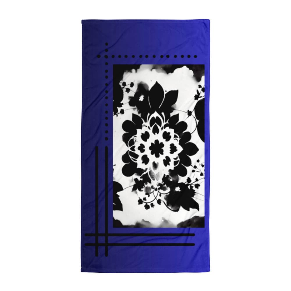 A blue and white towel with black flowers on it