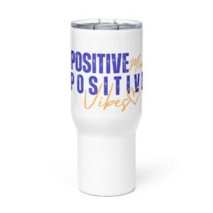 A white cup with the words " positive vibes ".