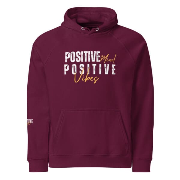 A maroon hoodie with the words " positive vibes ".