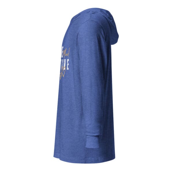 A blue long sleeve shirt with the word " life " on it.