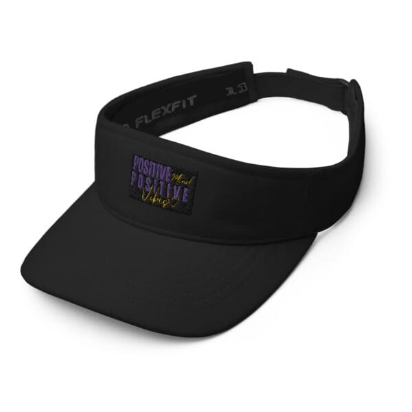 A black visor with the words " good fortune " on it.