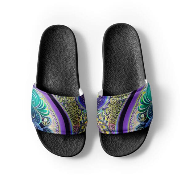 A pair of black sandals with a colorful design.