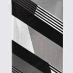 Geometric black and white patterned blanket.