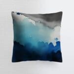 Abstract blue and gray decorative pillow.